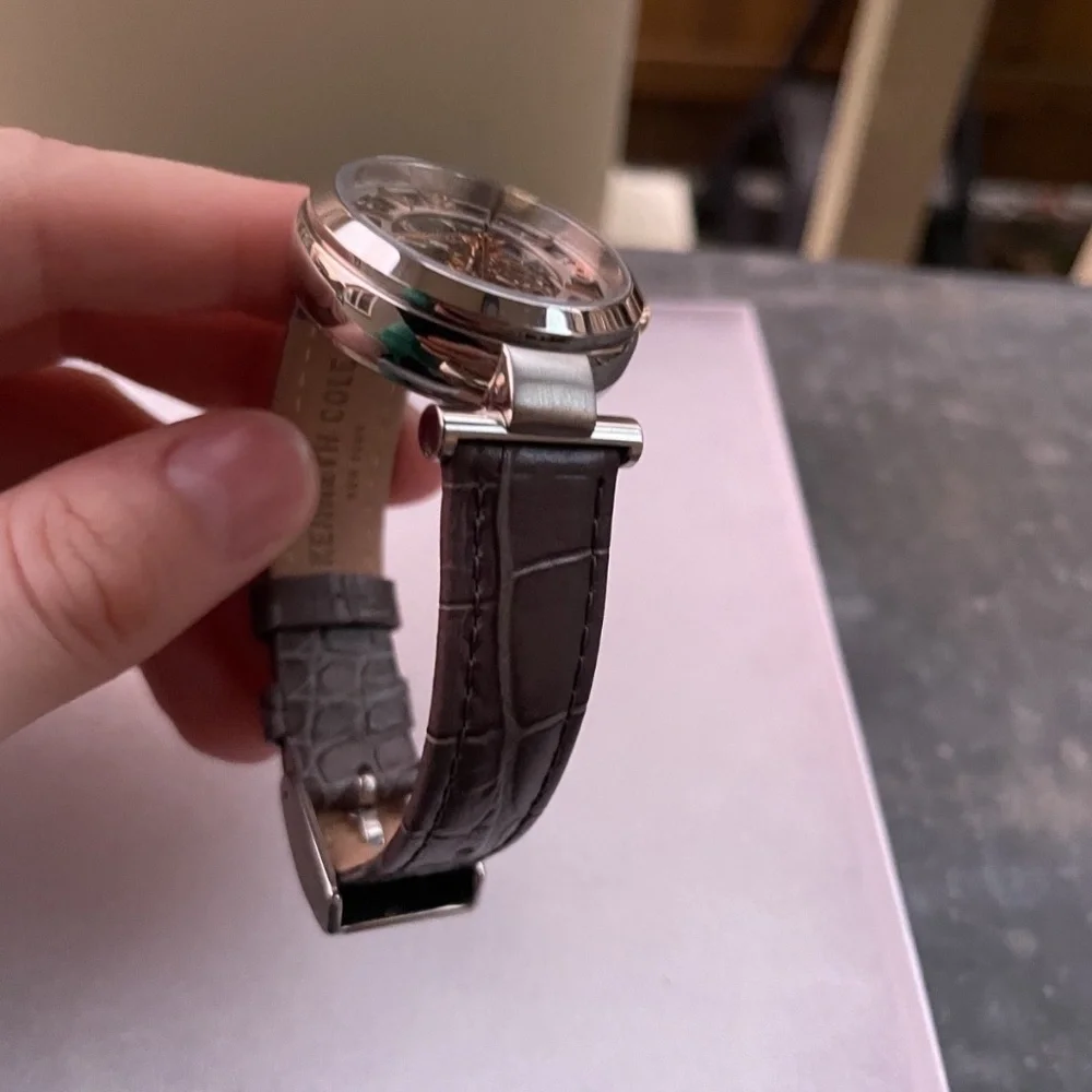 Vintage Kenneth Cole Women's Skeleton water resistant gray leather band Watch
